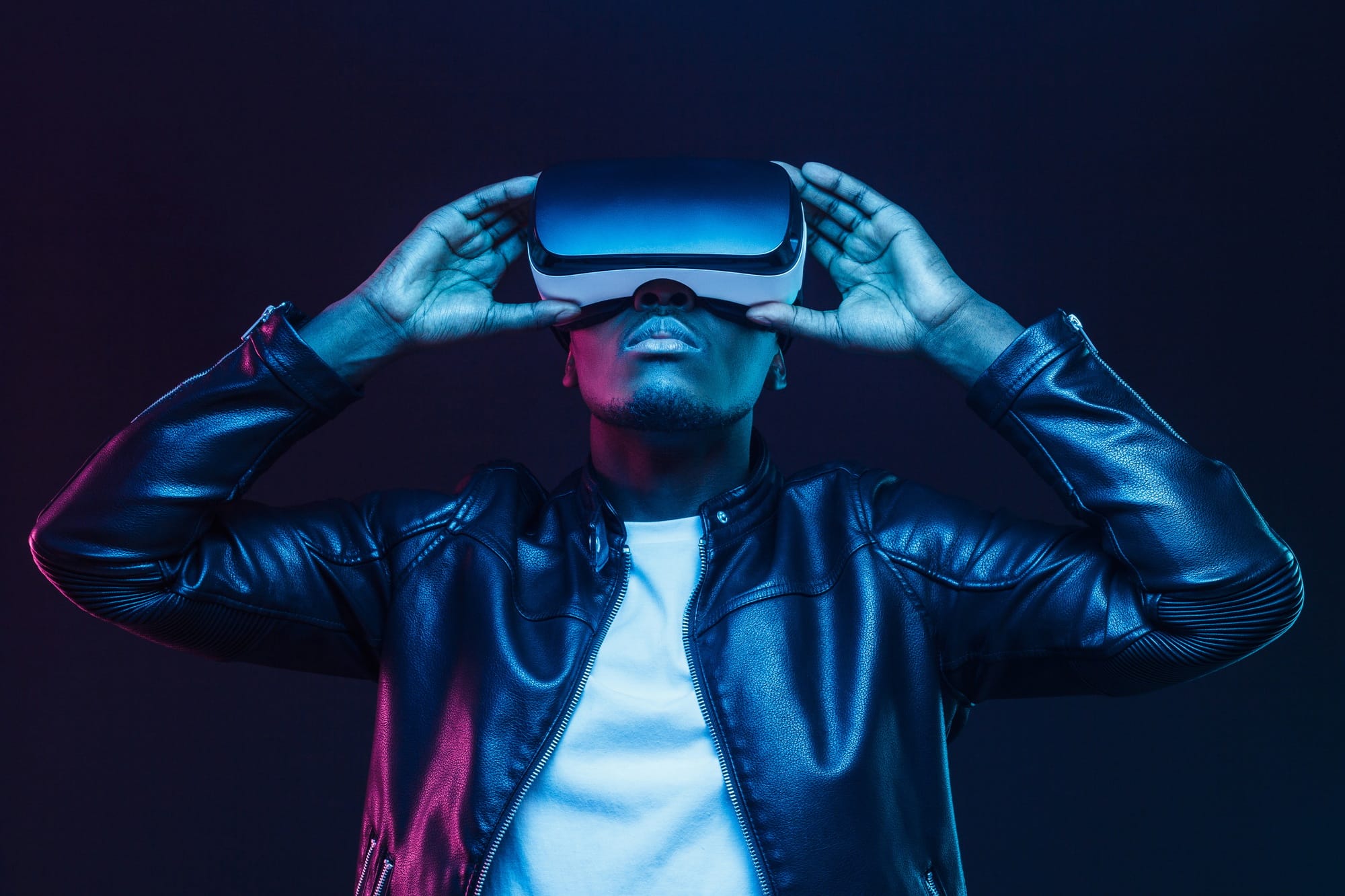 African american man in vr glasses, watching 360 degree video with virtual reality headset